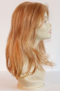 available for rent: cherry blonde human hair wig with lighter blonde streaks, in human hair, natural skin top